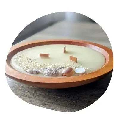 Bougie déco au sable et coquillages de Fakarava